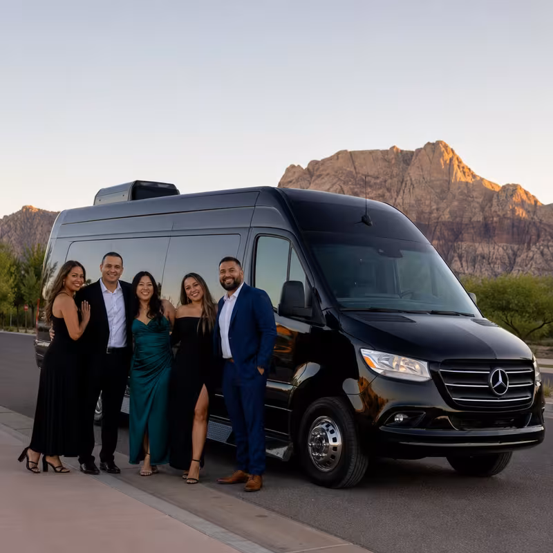 Group beside a Mercedes Sprinter limo from the Gilbert fleet