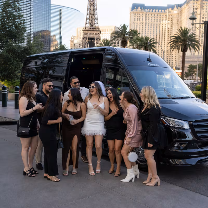 Group boarding a white charter bus for Bachelor & Bachelorette Transportation transportation in Gilbert