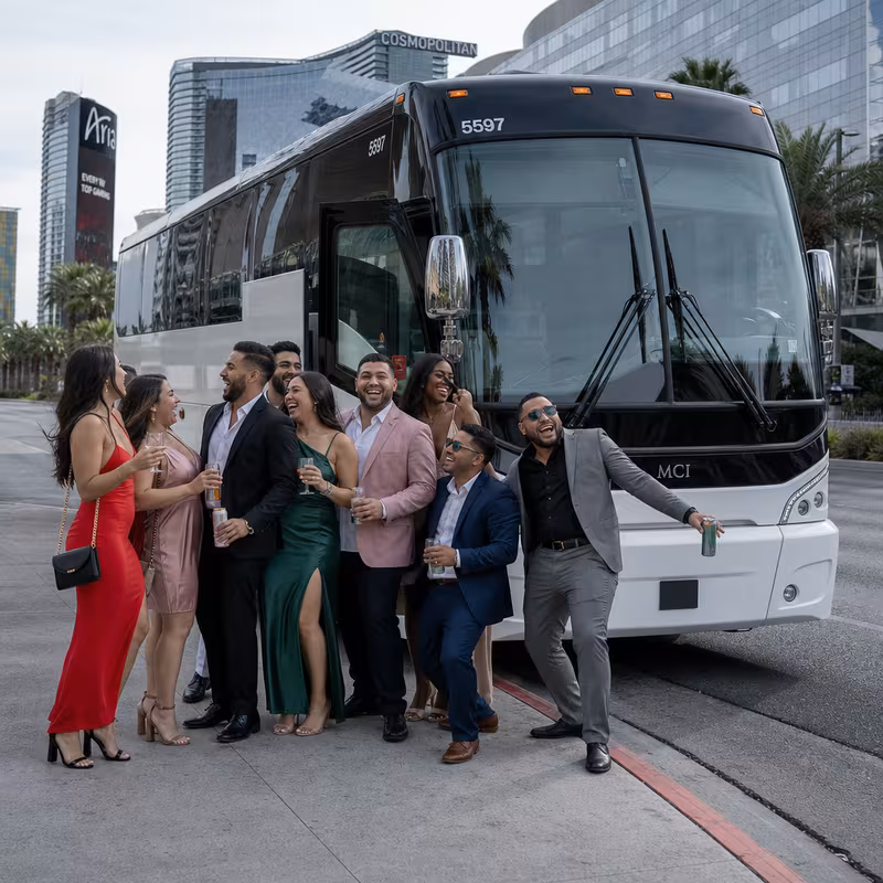Passengers loading luggage while boarding an Gilbert group shuttle