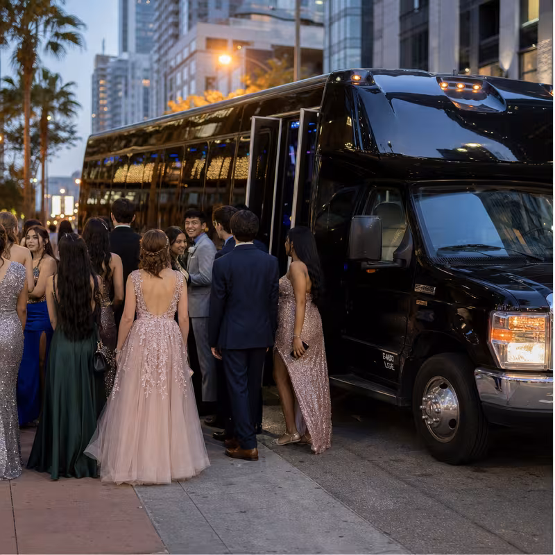 Passengers loading luggage while boarding an Gilbert group shuttle